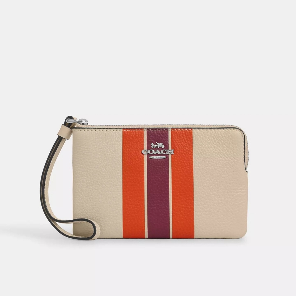 Coach Corner zip Wristlet with Stripe.